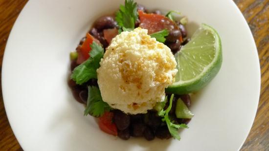 Gluten-free chipotle Frito meringue over Mexican bean salad